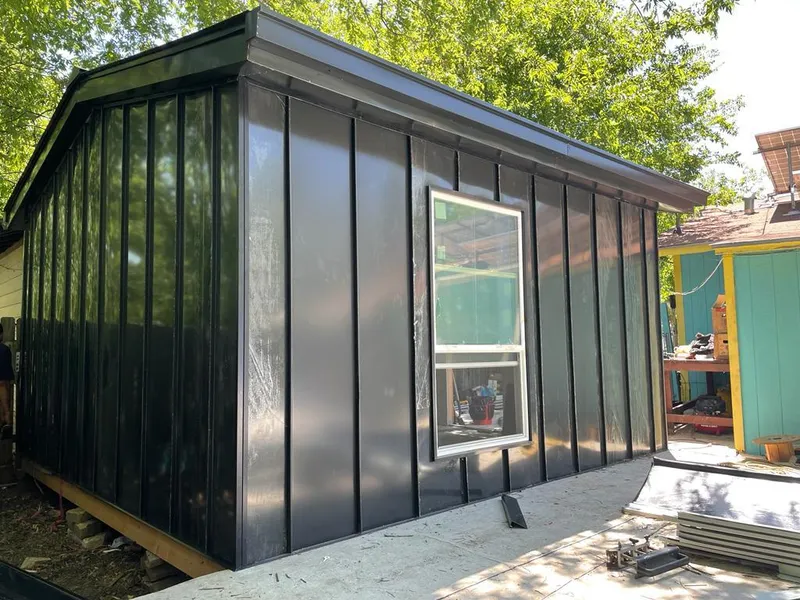 Black standing seam metal wall panels for Metal Roof Installation in Livonia